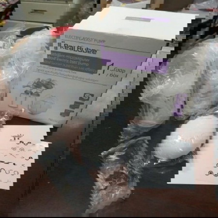 Preloved electric automatic breastpump with free 10pcs milk storage bag