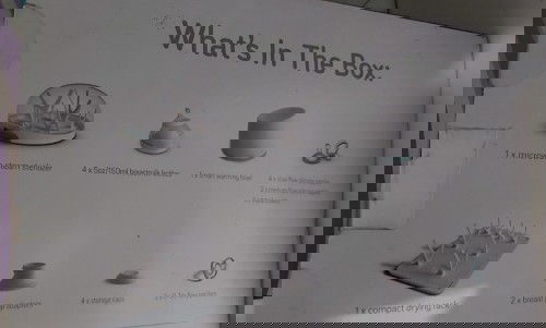 Nanobebe bottles and Wisemom portable double electric breast pump + 4pcs dula bottles (all 2nd hand)