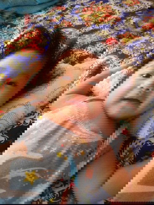 Maagang pagbuhat ng patayo/paupo ni baby