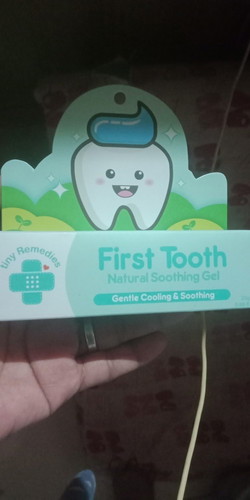 first tooth