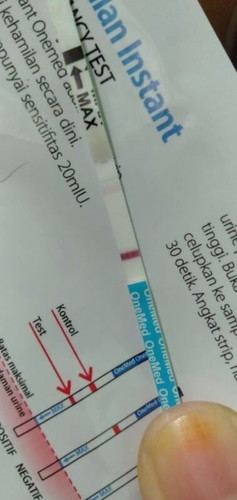 hasil test pack 2 garis berjauhan