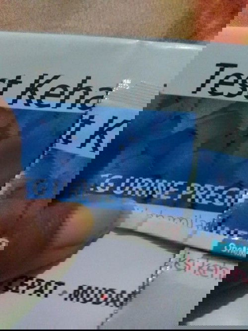 hasil test pack 2 garis berjauhan