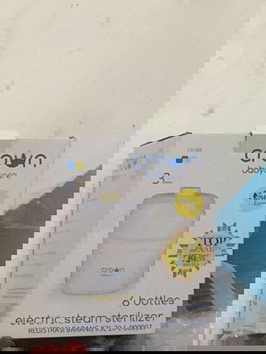 Mencairkan asi beku di alat pemanas susu sterillzer multifungsi