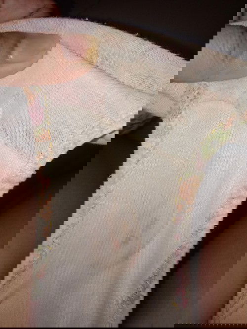 Light watery brown discharge