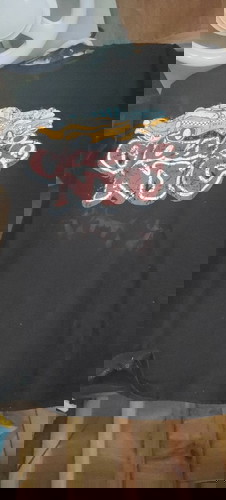 How to remove zonrox stain to black shirt?
