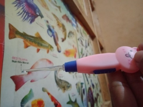 Bersihin telinga bayi