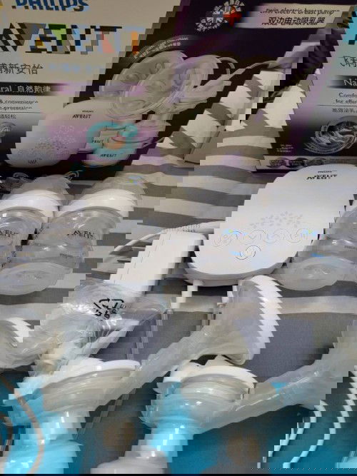 เครื่องปั้มนม