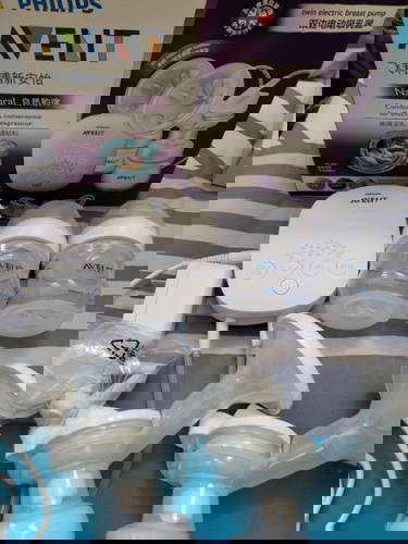 เครื่องปั้มนม