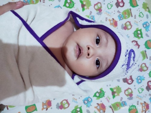 Tips Melatih Anak Berguling