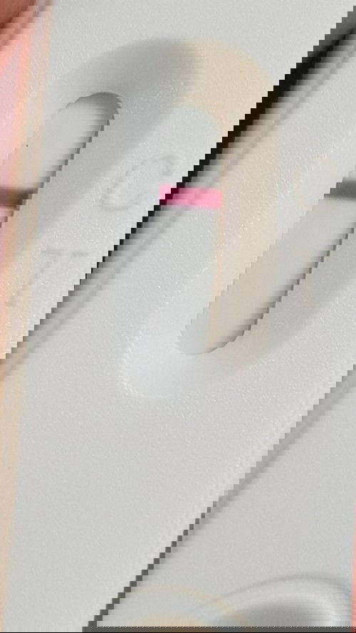 Very faint line after 7 mins of testing.what do u see? pls help. 11 dpo