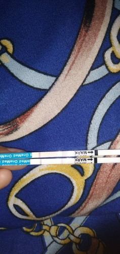 Apa ini positif udah telat 2minggu garisnya berjauhan apa itu 2 garis apa bukan, saya baru pertama