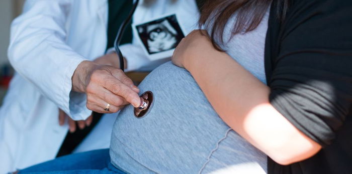 Woman conceives while pregnant - superfetation