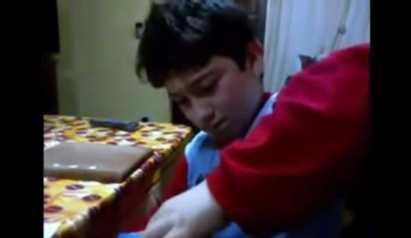 Boy gets a chopping board for his birthday - Click to see his reaction!