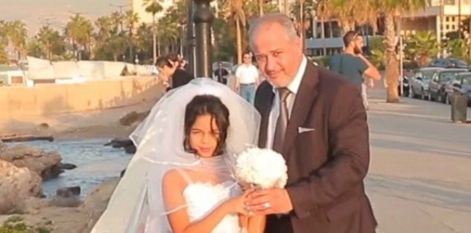 Horrified passers by witness middle aged man marrying 12-year old girl in a viral video