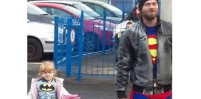 Dad encourages daughter to wear her superhero costume with pride