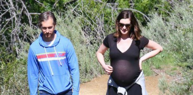 LOOK: Anne Hathaway shows off baby bump on afternoon hike