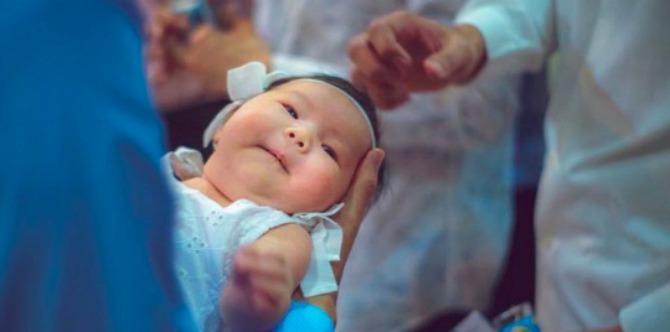 LOOK: Chris Tiu's six-week-old daughter Amanda gets baptized
