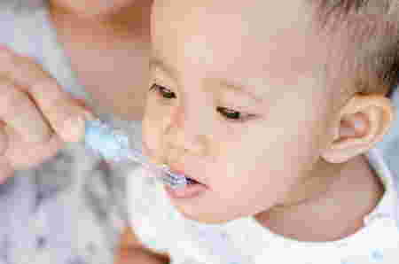 brushing baby teeth