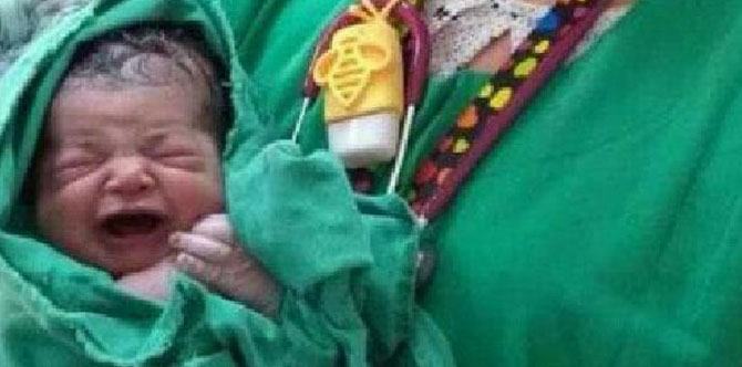 This mom's newborn photo accidentally included an embarrassing detail