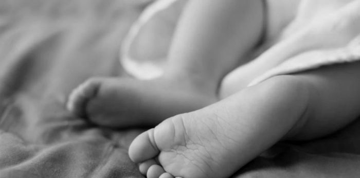 9 month old baby girl suffocates to death after falling off her parent's bed