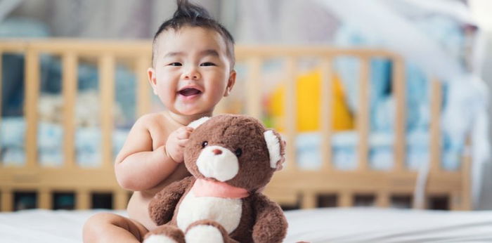 Baby milestones: When do babies sit up and crawl?