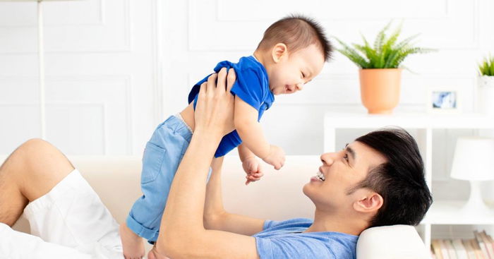 Why Do Men Only Hold Their Own Babies?