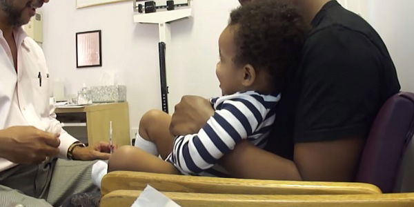 Cute! Baby laughs while getting shots