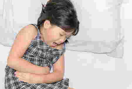 asian child suffering from stomachache and lying on bed, Top view. diarrhea or healthy concept - diarrhoea in children article