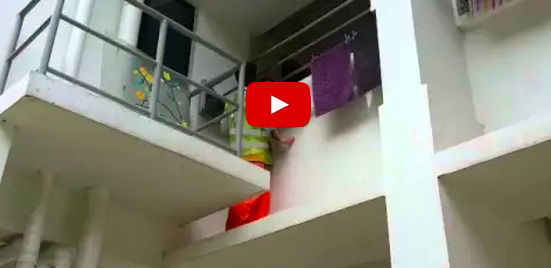 Foreign worker saves toddler stuck between railings of HDB block