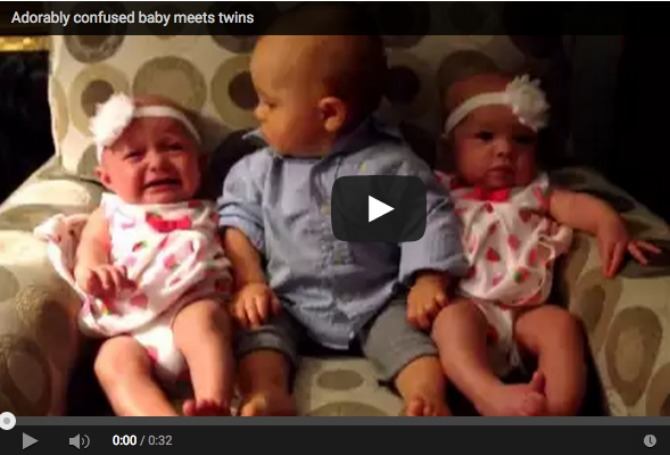 Baby meets twins for the first time - his reaction is too adorable!