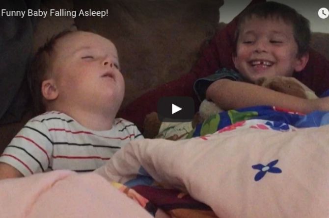 Little boy laughs at his baby brother -- the reason is hilarious!