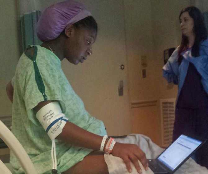 Diligent mum finishes a college exam... while in labour!