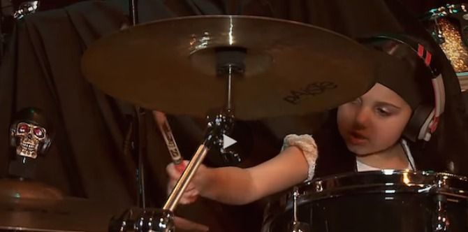 5 Year Old performs an awesome drum performance