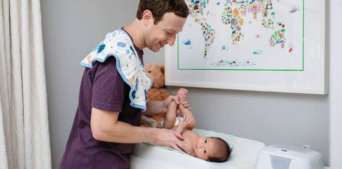 Mark Zuckerberg flexing his diaper duty skills and loving it!