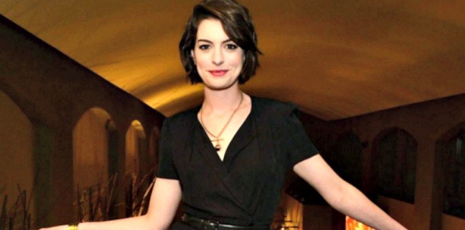 LOOK: Anne Hathaway shows off baby bump in stunning bikini photo