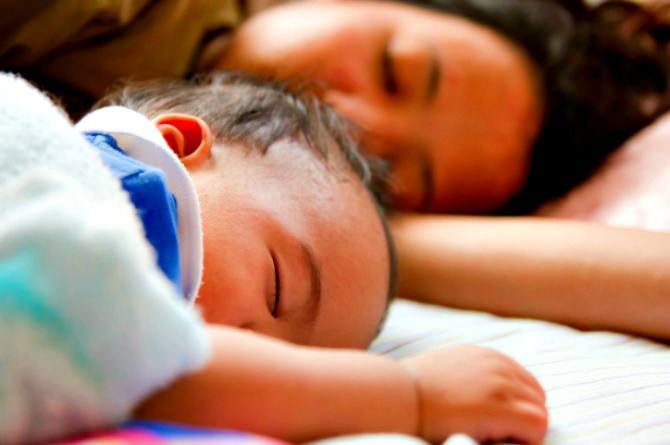Baby's death caused by mom rolling over her, alleges dad