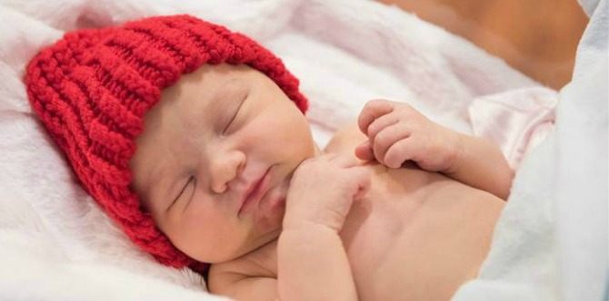 These babies in red hats are on a special mission