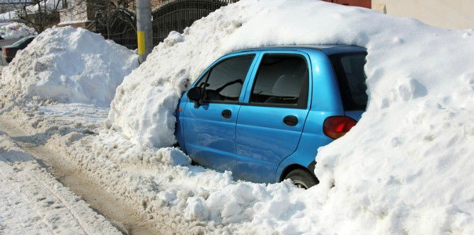 Mum and child die inside the car as dad shovels snow outside