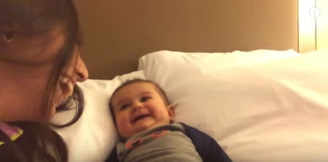 Mother's fake coughing makes her baby crack up