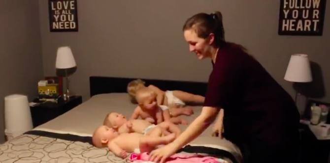 Watch how this mum manages to dress her triplets and her toddler