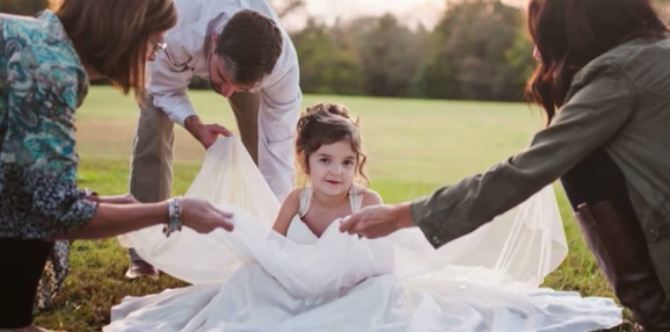 4-year-old wears her mum's wedding dress -- The reason will make you cry