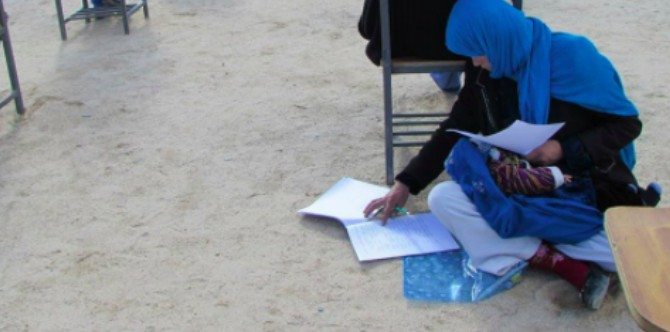 This mum breastfeeding her baby while taking an exam is truly inspiring!