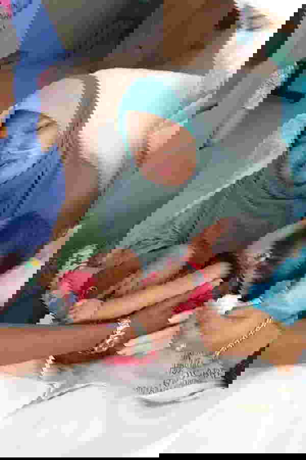 Mum wakes up from 5-month coma and sees her baby for the first time