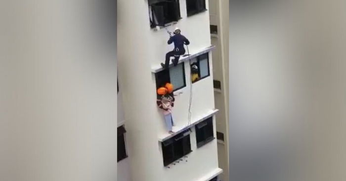 SCDF Rescues Elderly Woman Standing On Ledge Outside Jurong HDB Flat