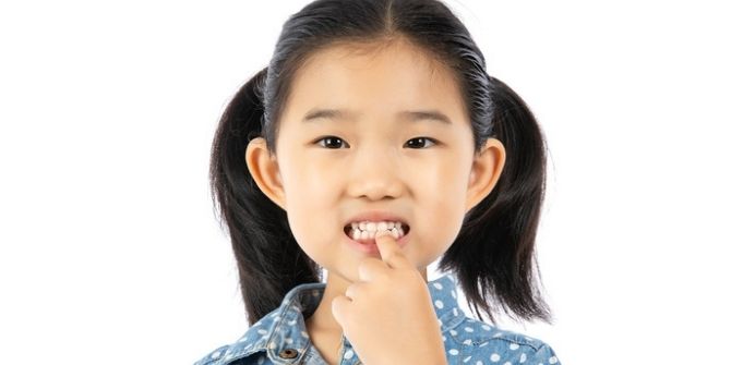 Did You Spot White Marks On Your Child's Teeth? Here's Why You Should Be Concerned