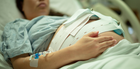 symptoms of low amniotic fluid