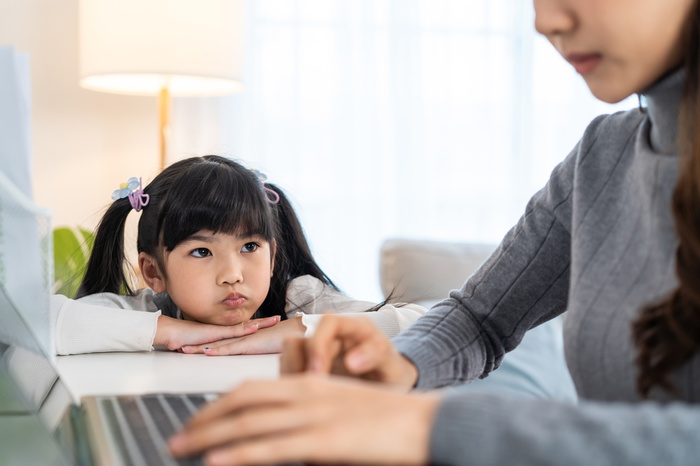 girl waiting for parent -  child has OCD