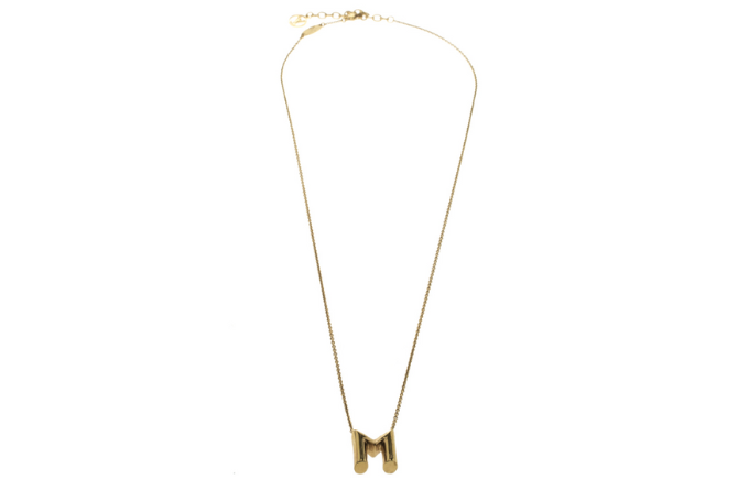 Terbuat dari gold tone metal