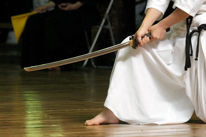 Single mum fights off intruder using samurai sword with her sons’ help