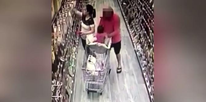 CCTV footage shows a man attempting to snatch a baby